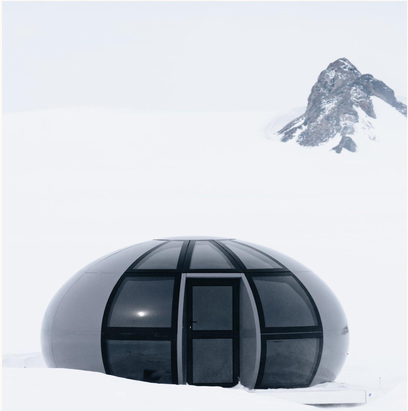 A geodesic sleeping pod in a remote polar landscape